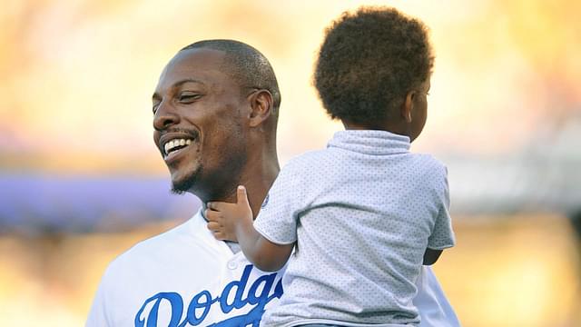 Los Angeles Clippers forward Paul Pierce in attendance with son Prince before the Los Angeles Dodgers play against the Oakland Athletics at Dodger Stadium.