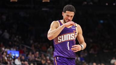 Phoenix Suns guard Devin Booker (1) reacts after being fouled by the New Orleans Pelicans in the fourth quarter at Footprint Center