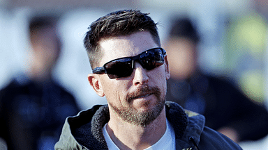 NASCAR Cup Series driver Denny Hamlin (11) walks the track before practice for the Clash at Bowman Gray at Bowman Gray Stadium.