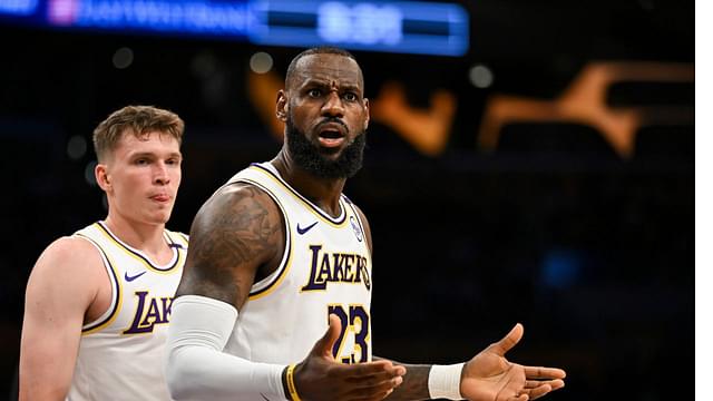 Los Angeles Lakers forward LeBron James (23) and guard Dalton Knecht (4) reacts to a ref’s call against the Sacramento Kings during the first half at Crypto.com Arena.