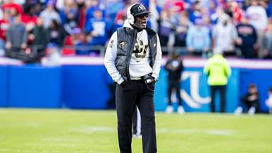 Colorado head coach Deion Sanders paces the field during the 2nd quarter between the Kansas Jayhawks and the Colorado Buffaloes at GEHA Field at Arrowhead Stadium.