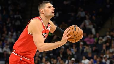 Chicago Bulls center Nikola Vucevic (9) shoots the ball against the Minnesota Timberwolves during the first quarter at Target Center.