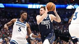 Dallas Mavericks guard Luka Doncic (77) dribbles against Minnesota Timberwolves guard Anthony Edwards (5) during the third quarter of game four of the western conference finals for the 2024 NBA playoffs at American Airlines Center