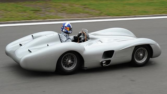 FORMER DRIVER DAVID COULTHARD DRIVING OLD SILVER ARROW 1954-1955 MERCEDES W196. GERMAN F1 GRAND PRIX 2011