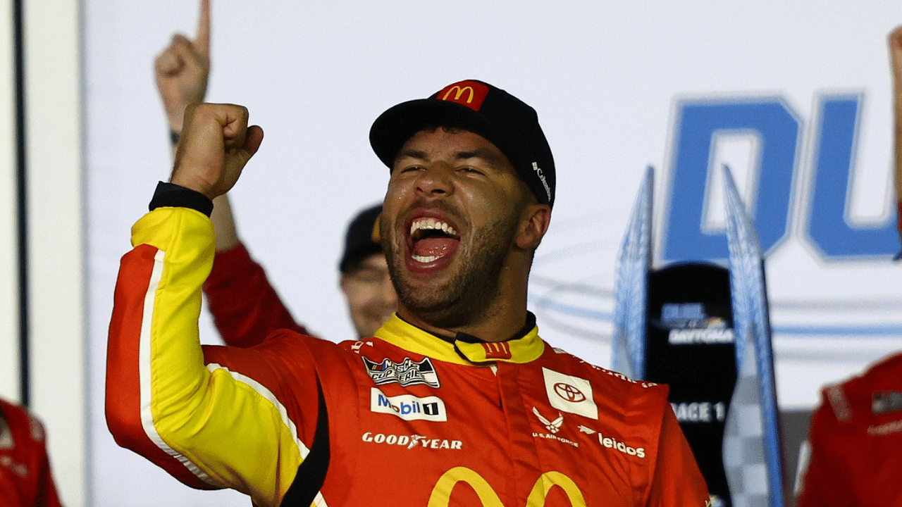 NASCAR Cup Series driver Bubba Wallace (23) reacts after winning Duel 1 at Daytona International Speedway.