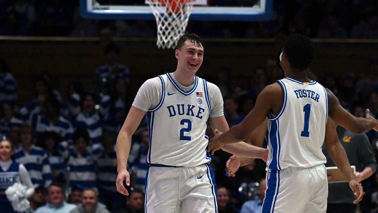 Duke Blue Devils forward Cooper Flagg (2) is congratulated by guard Caleb Foster (1) after dunking during the second half against the California Golden Bears at Cameron Indoor Stadium.