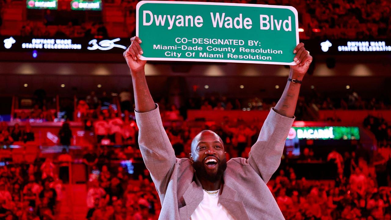 Former Miami Heat guard Dwyane Wade is honored with 'Dwayne Wade Blvd' during halftime against the Detroit Pistons at Kaseya Center.