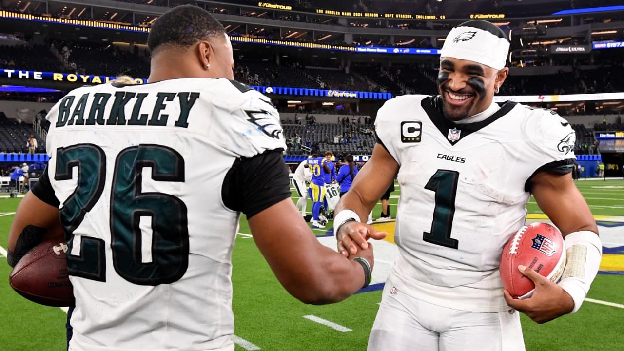 Nov 24, 2024; Inglewood, California, USA; Philadelphia Eagles quarterback Jalen Hurts (1) celebrates with running back Saquon Barkley (26) after the Eagles defeat the Los Angeles Rams during the first half at SoFi Stadium.