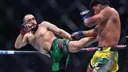 Belal Muhammad (red gloves) fights Gilbert Burns (blue gloves) during UFC 288 at Prudential Center