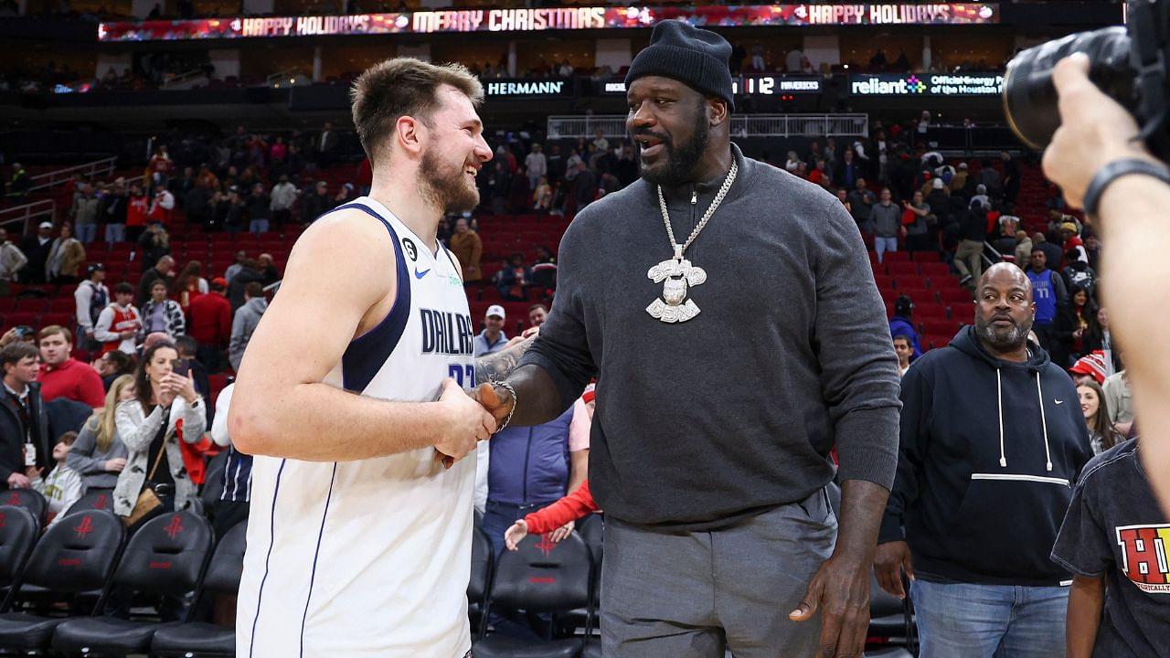 Dallas Mavericks guard Luka Doncic (77) greets Shaquille O'Neal after the game against the Houston Rockets at Toyota Center.