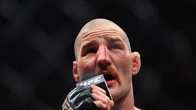 Sean Strickland of United States speaks to the crowd after his loss to Dricus Du Plessis of South Africa in his middleweight title bout during the UFC 312 event at Qudos Bank Arena in Sydney, Sunday, February 9, 2025