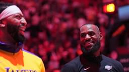 Los Angeles Lakers forward LeBron James, right, and forward Anthony Davis during pregame ceremonies before a game against the Miami Heat at Kaseya Center