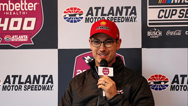 Feb 25, 2024; Hampton, Georgia, USA; NASCAR Cup Series driver Joey Logano (22) talks with the media prior to qualifying for the Ambetter Health 400 at Atlanta Motor Speedway. Mandatory Credit: David Yeazell-Imagn Images