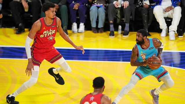 Shaqís OGs guard Kyrie Irving (11) of the Dallas Mavericks controls the ball against Chuckís Global Stars forward Victor Wembanyama (1) of the San Antonio Spurs during the 2025 NBA All Star Game at Chase Center.