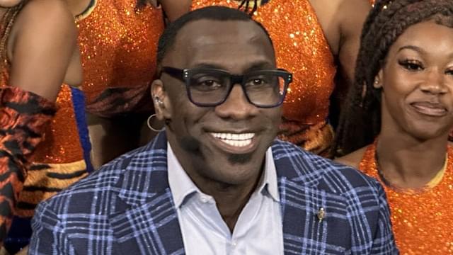 Shannon Sharpe poses with members of the Savannah State Marching Band after a broadcast of \"First Take\" at SSU Monday