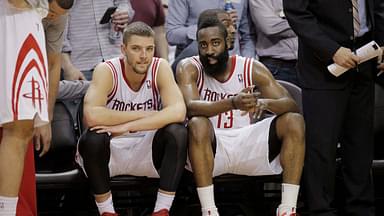 Houston Rockets small forward Chandler Parsons (25) and shooting guard James Harden (13) sit on the bench during the fourth quarter against the Portland Trail Blazers at Toyota Center.