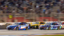 Kyle Larson (5) fights for position during the final laps at Atlanta Motor Speedway.