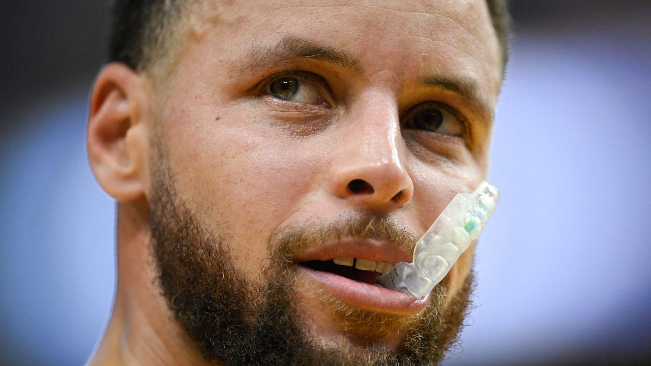 Golden State Warriors guard Stephen Curry (30) chews his mouthguard against the Indiana Pacers in the fourth quarter at Chase Center.