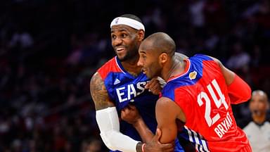 Western Conference guard Kobe Bryant (24) of the Los Angeles Lakers grabs onto Eastern Conference forward LeBron James (6) of the Miami Heat in the fourth quarter of the 2013 NBA all star game at the Toyota Center.