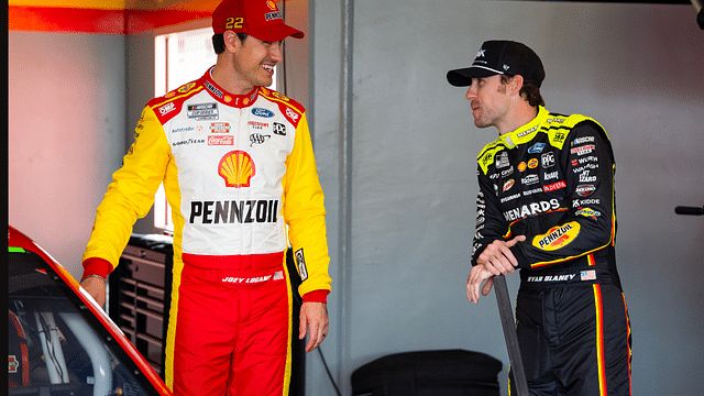 Feb 12, 2025; Daytona Beach, Florida, USA; NASCAR Cup Series driver Joey Logano (left) talks with teammate Ryan Blaney during practice for the Daytona 500 at Daytona International Speedway. Mandatory Credit: Mark J. Rebilas-Imagn Images