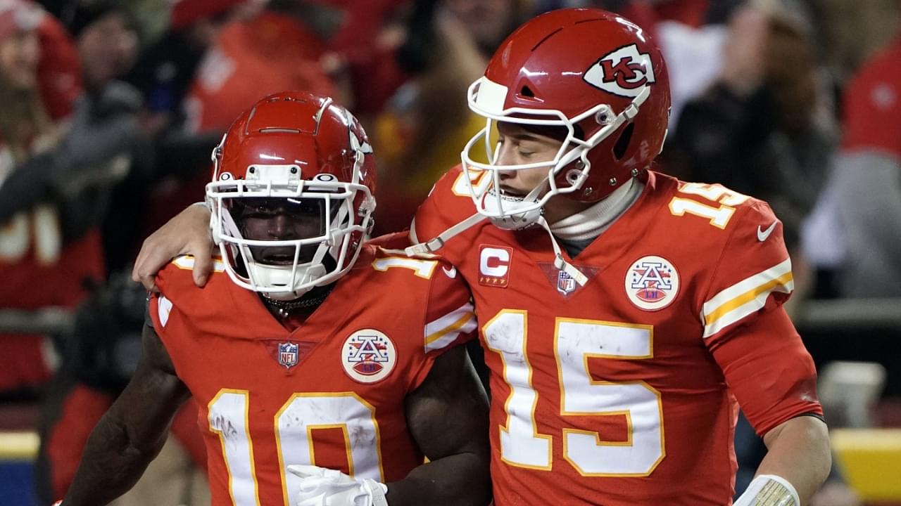 Jan 23, 2022; Kansas City, Missouri, USA; Kansas City Chiefs wide receiver Tyreek Hill (10) celebrates his touchdown with quarterback Patrick Mahomes (15) against the Buffalo Bills during the second half of the AFC Divisional playoff football game at GEHA Field at Arrowhead Stadium.