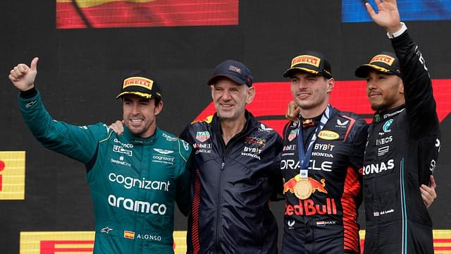 (L-R) Second placed FERNANDO ALONSO of Spain and Aston Martin F1 Team, ADRIAN NEWEY, the Chief Technical Officer of Red Bull Racing, First placed MAX VERSTAPPEN of the Netherlands and Oracle Red Bull Racing and Third placed LEWIS HAMILTON of Great Britain and Mercedes celebrate on the podium after the F1 Grand Prix of Canada at Circuit Gilles Villeneuve on June 18, 2023 in Montreal, Quebec, Canada