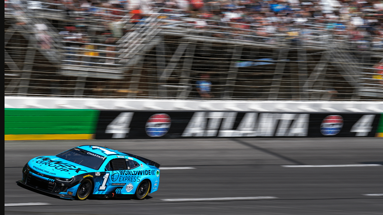 Sep 8, 2024; Hampton, Georgia, USA; NASCAR Cup Series driver Ross Chastain (1) coming out of turn four at Atlanta Motor Speedway. Mandatory Credit: Jason Allen-Imagn Images