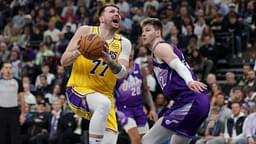 Los Angeles Lakers guard Luka Doncic (77) is fouled by Utah Jazz forward Kyle Filipowski (22) during the second quarter at Delta Center.