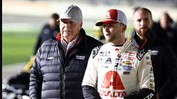 Feb 14, 2024; Daytona Beach, Florida, USA; NASCAR Cup Series driver William Byron (24) and Rick Hendrick (left) walk on pit row during qualifying for the Daytona 500 at Daytona International Speedway. Mandatory Credit: Mark J. Rebilas-Imagn Images