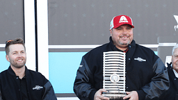 Rudy Fugle, crew chief for Hendrick Motorsports' No. 24 team, poses with his trophy in Victory Lane, Monday, Feb. 17, 2025.