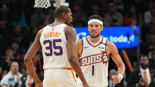 Phoenix Suns forward Kevin Durant (35) and Phoenix Suns guard Devin Booker (1) celebrate against the LA Clippers during the second half at Footprint Center