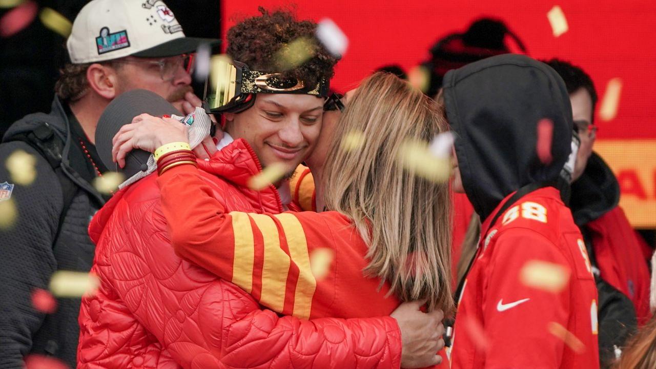 Kansas City Chiefs quarterback Patrick Mahomes (15) embraces his mother Randi Martin during the Kansas City Chiefs Super Bowl parade.