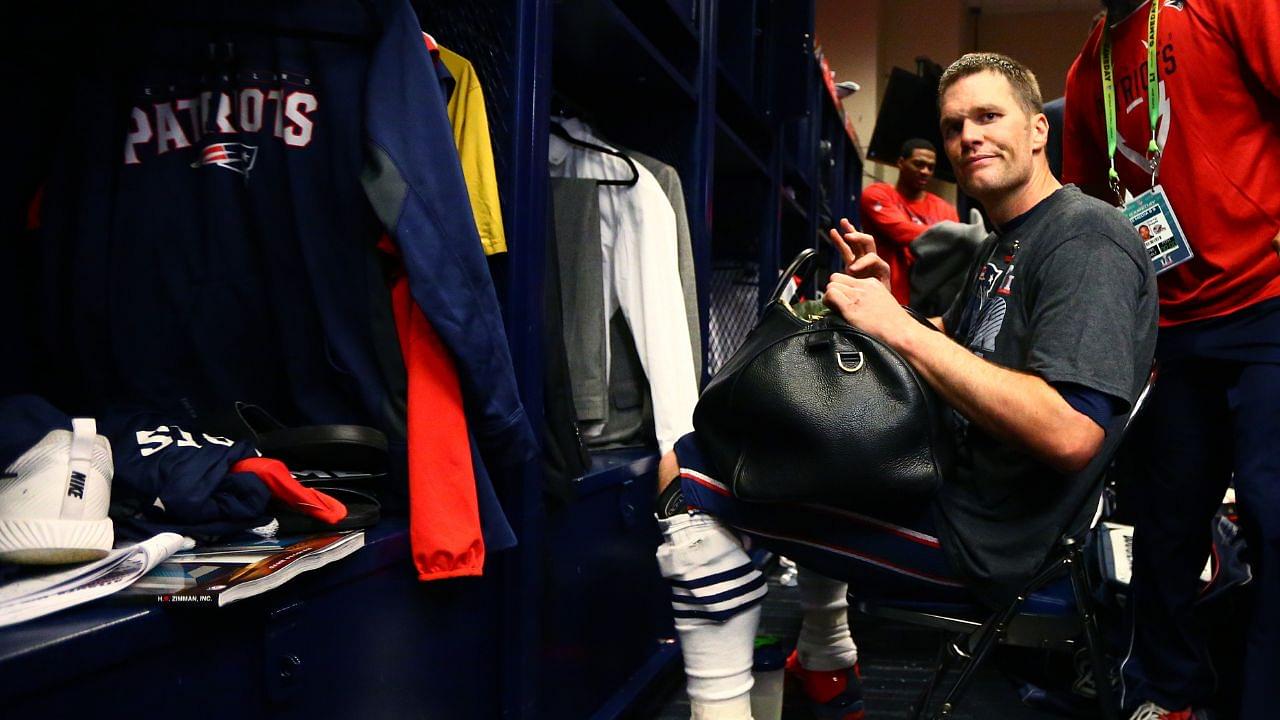 New England Patriots quarterback Tom Brady reacts in the locker room as he looks for his jersey after defeating the Atlanta Falcons during Super Bowl LI at NRG Stadium.