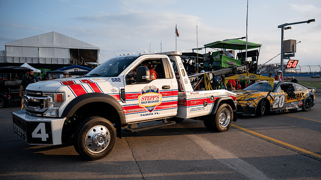 NASCAR Cup Series driver Christopher Bell’s car is towed away after a collision during the Ally 400 at Nashville Superspeedway in Lebanon, Tenn., Sunday, June 30, 2024.