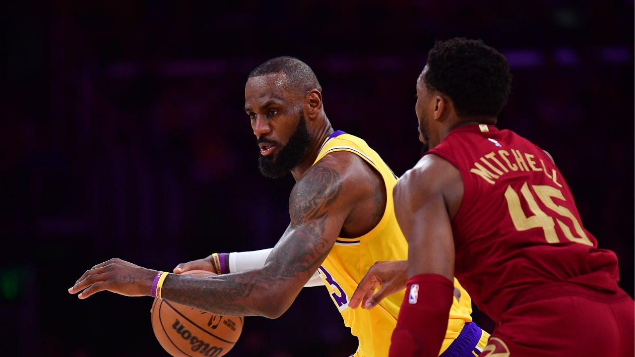 Los Angeles Lakers forward LeBron James (23) moves the ball against Cleveland Cavaliers guard Donovan Mitchell (45) during the first half at Crypto.com Arena