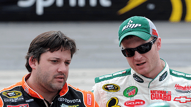 NASCAR SPRINT Cup Series drivers Tony Stewart (20) and Dale Earnhardt Jr (88) during Qualifying for the Goody's Cool Orange 500 at Martinsville Speedway.