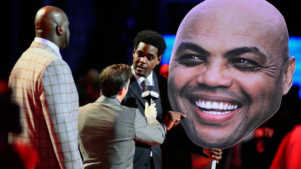 Chris Webber is interviewed with a poster of Team Chuck head coach Charles Barkley (not pictured) while Team Shaq head coach Shaquille O'Neal looks on during prior to the rising stars challenge during the 2013 NBA All-Star weekend at the Toyota Center. Mandatory Credit: Bob Donnan-Imagn Images