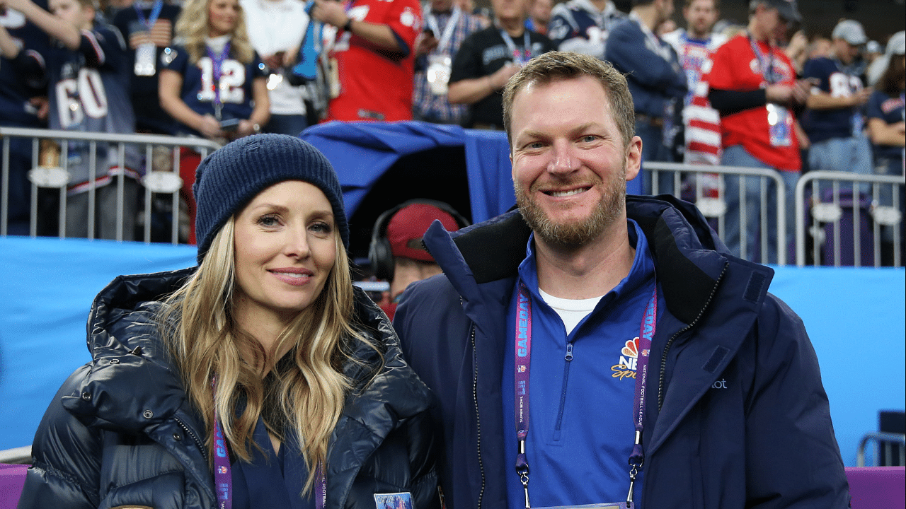 Feb 4, 2018; Minneapolis, MN, USA; NASCAR retired driver Dale Earnhardt, Jr. and wife Amy Reimann in attendance before Super Bowl LII between the Philadelphia Eagles and the New England Patriots at U.S. Bank Stadium. Mandatory Credit: Mark J. Rebilas-Imagn Images