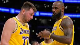 Los Angeles Lakers forward LeBron James (23) checks on guard Luka Doncic (77) after he was hit in the face against the Utah Jazz at Crypto.com Arena