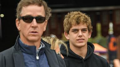 Recruit Arch Manning, right, and his father Cooper Manning before the game between Clemson and Florida State at Memorial Stadium.