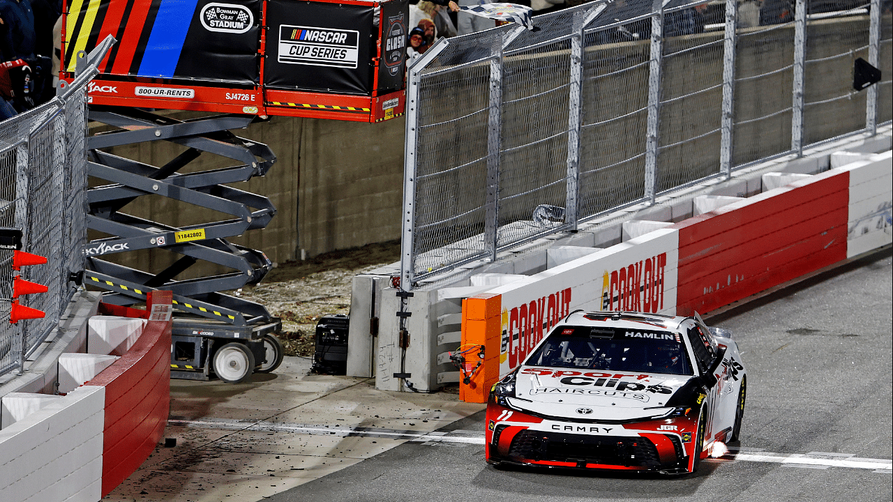 Feb 1, 2025; WInston-Salem, North Carolina, USA; NASCAR Cup Series driver Denny Hamlin (11) during the heat races for the Clash at Bowman Gray at Bowman Gray Stadium. Mandatory Credit: Peter Casey-Imagn Images