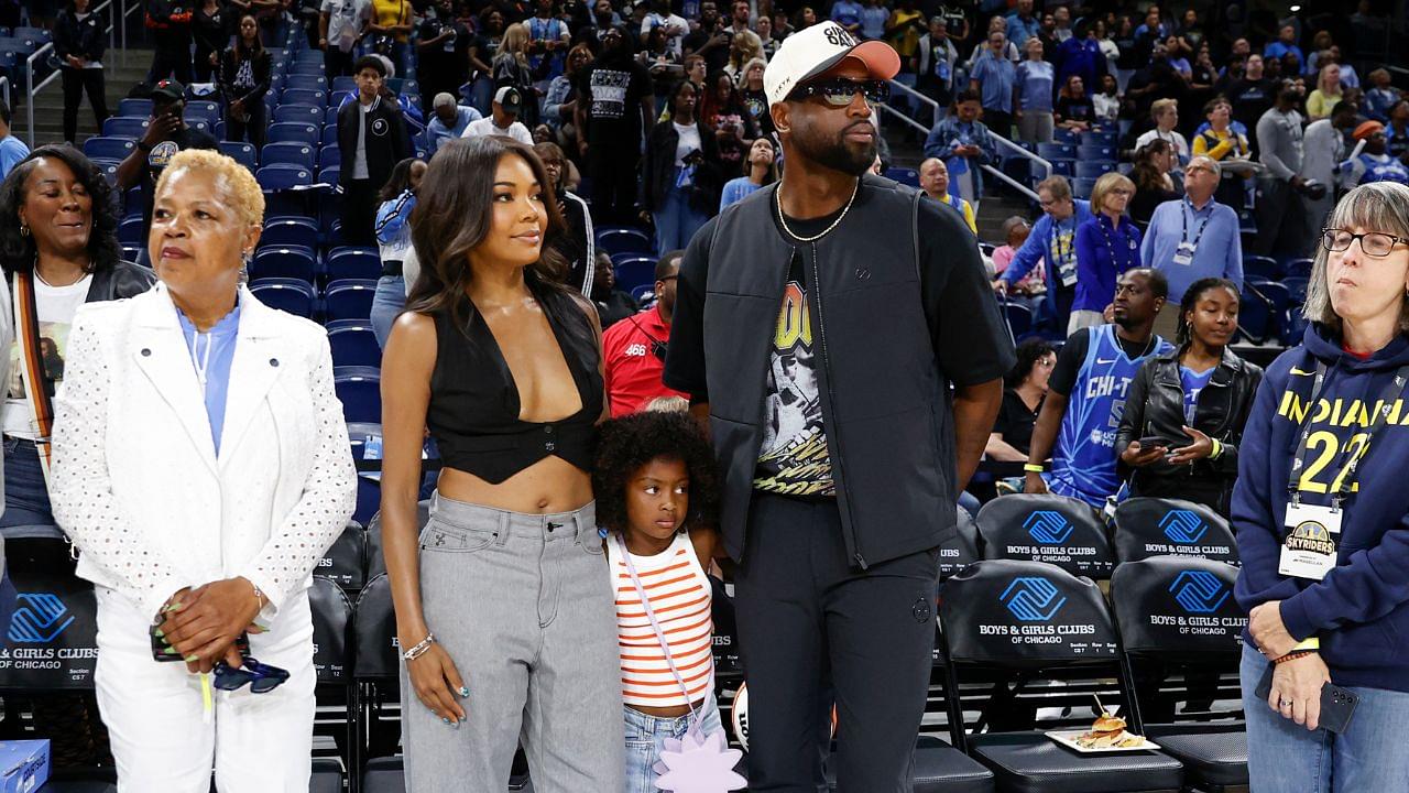 Former basketball player Dwyane Wade attends with his wife Gabrielle Union a WNBA game between the Chicago Sky and Connecticut Sun at Wintrust Arena.