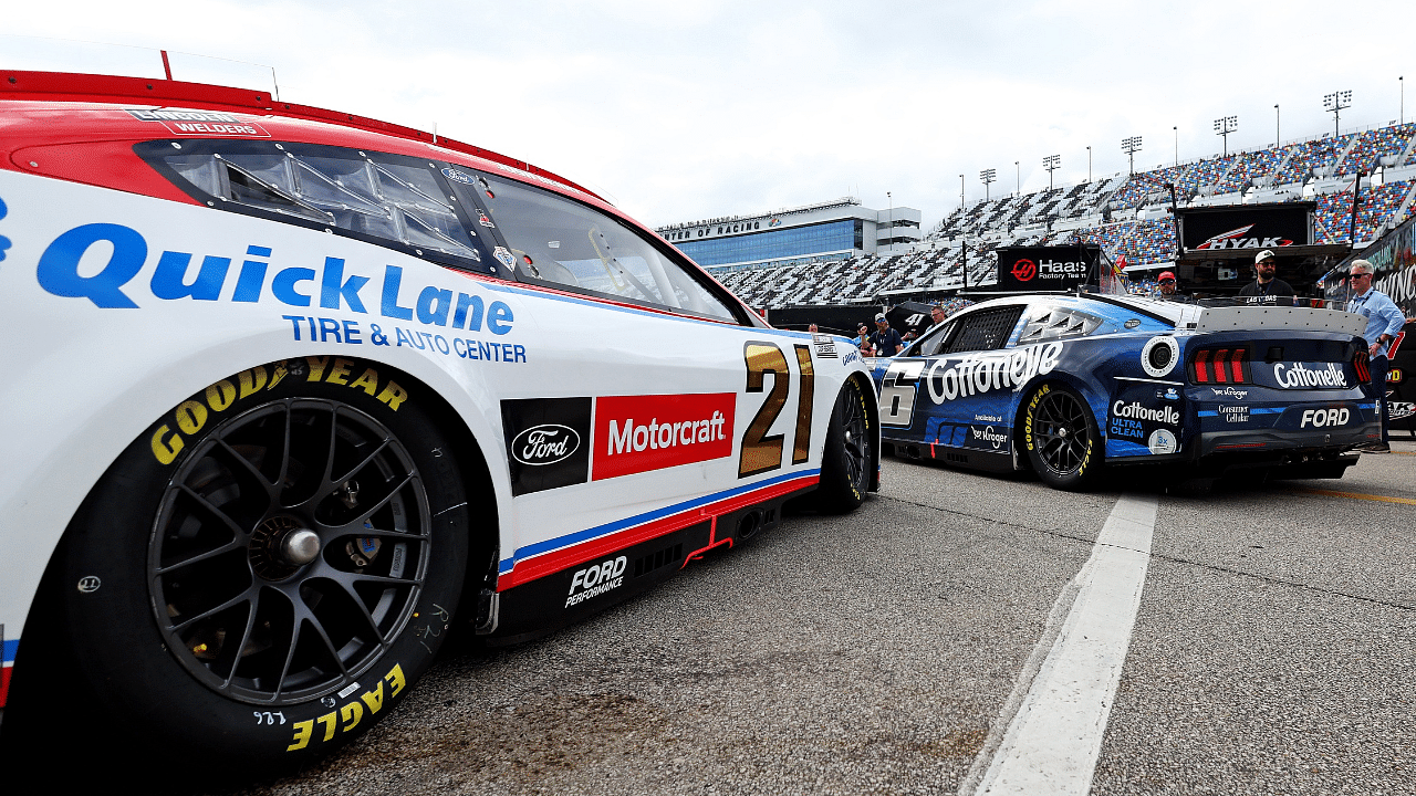 NASCAR Cup Series driver Josh Berry (21) and NASCAR Cup Series driver Brad Keselowski (6) during practice for the Daytona 500 at Daytona International Speedway.