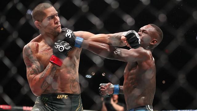 L-R) Alex Pereira punches Israel Adesanya in their middleweight fight during the UFC 287 event at Kaseya Center on April 8, 2023 in Miami, FL, United States. Miami, FL United States - ZUMAp175 20230408_zsa_p175_193 Copyright: xAlejandroxSalazarx