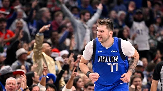 Dallas Mavericks guard Luka Doncic (77) celebrates after making a basket against the Minnesota Timberwolves during the first quarter at the American Airlines Center.