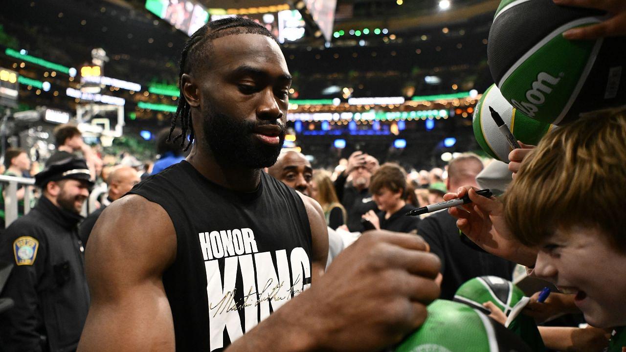 Boston Celtics guard Jaylen Brown (7) signs autographs before a game against the San Antonio Spurs at the TD Garden.