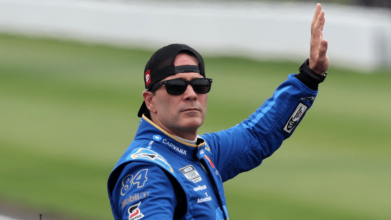 NASCAR Cup Series driver Jimmie Johnson (84) waves to the crowd before the Brickyard 400 at Indianapolis Motor Speedway.