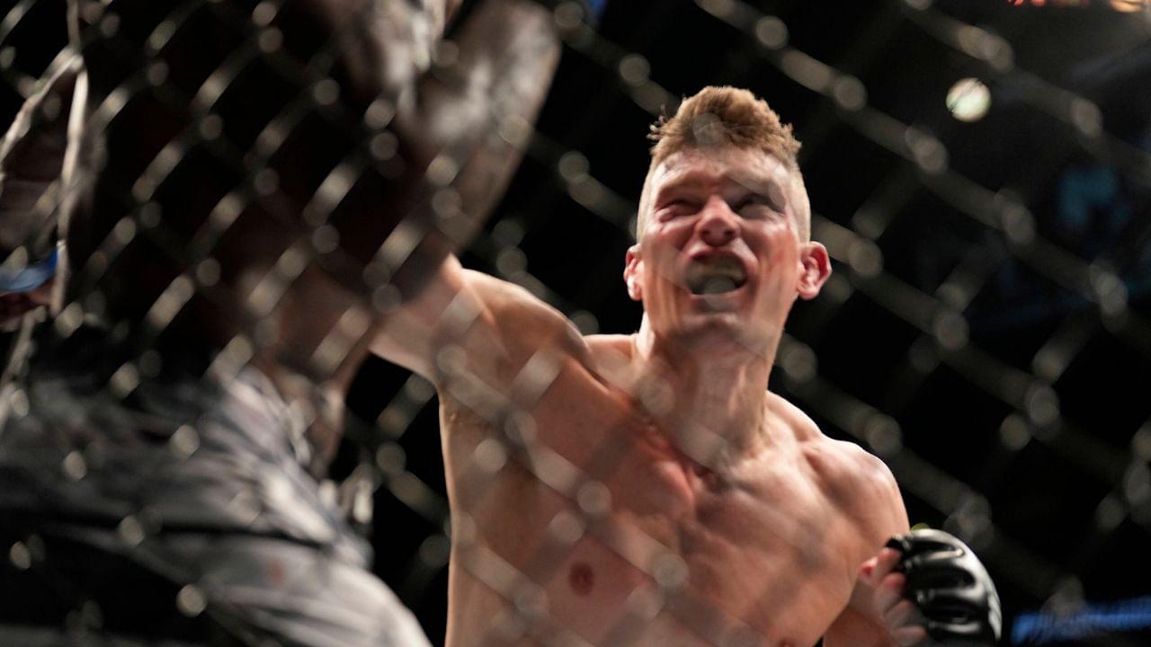 Stephen Thompson (L) and Kevin Holland (R) step in the octagon for a 5-round bout at Amway Center for UFC Orlando