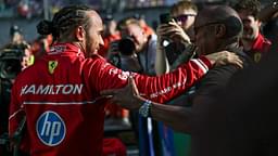 Lewis Hamilton of Great Britain and Scuderia Ferrari celebrates his pole with his father Anthony Hamilton during Sprint Qualifying ahead of the F1 Grand Prix of China