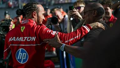 Lewis Hamilton of Great Britain and Scuderia Ferrari celebrates his pole with his father Anthony Hamilton during Sprint Qualifying ahead of the F1 Grand Prix of China